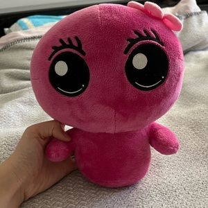 Pink plush with flower on head
